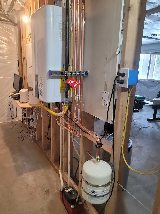 Licensed plumber repairing a kitchen sink in Sunset